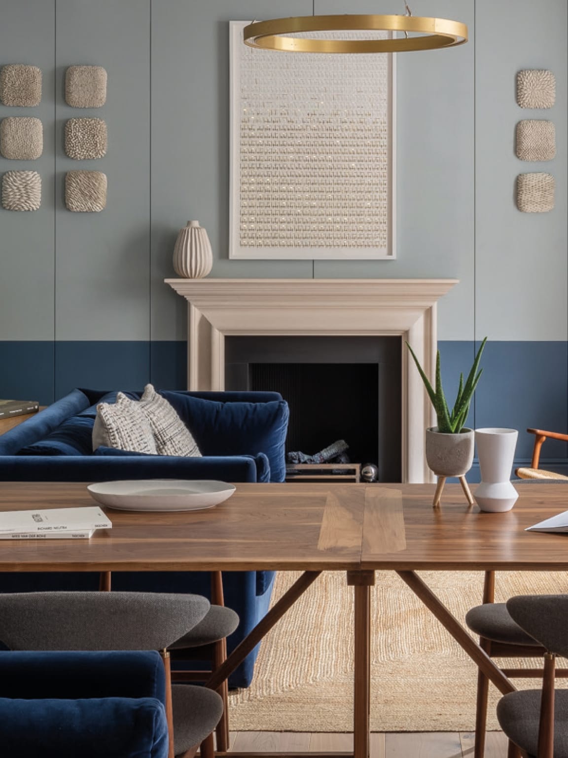 seating area with table and fireplace