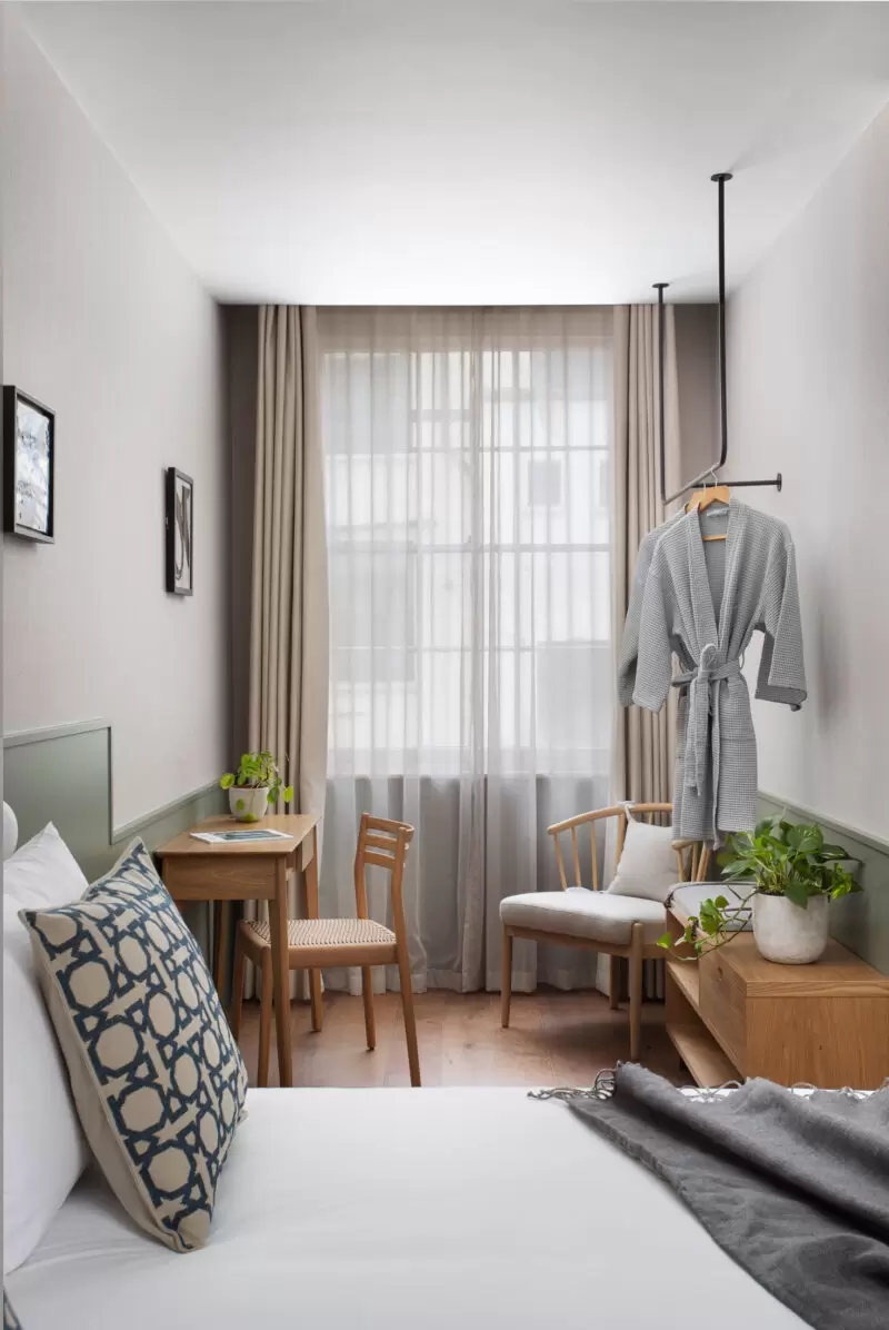 Bedroom at Inhabit hotel