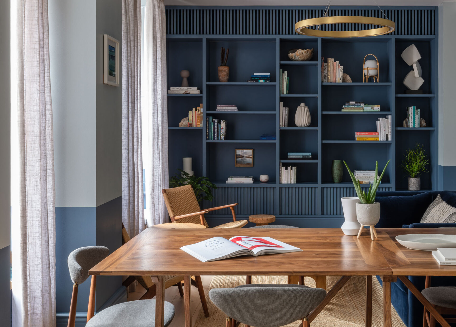 Seating area at Inhabit hotel with table