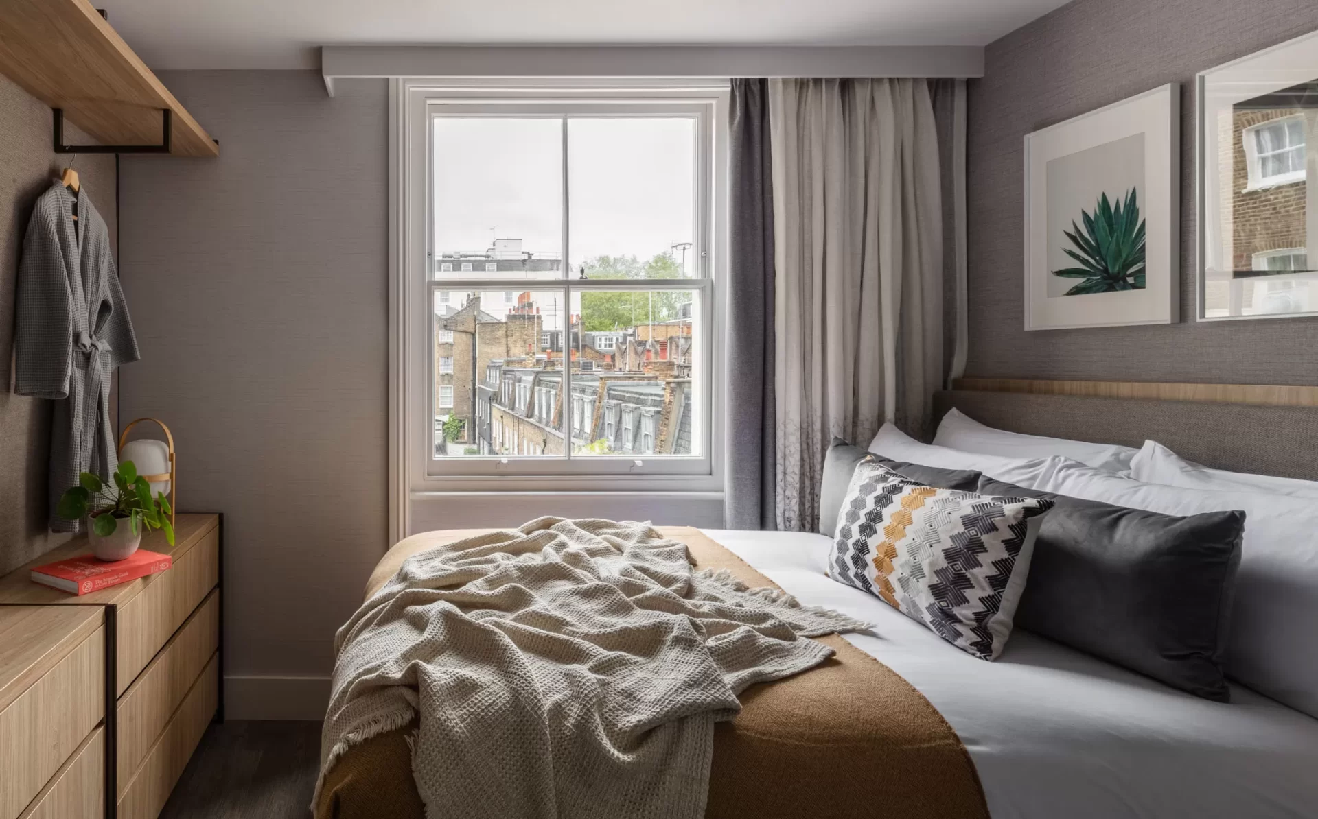 inhabit hotel bedroom with yellow accents