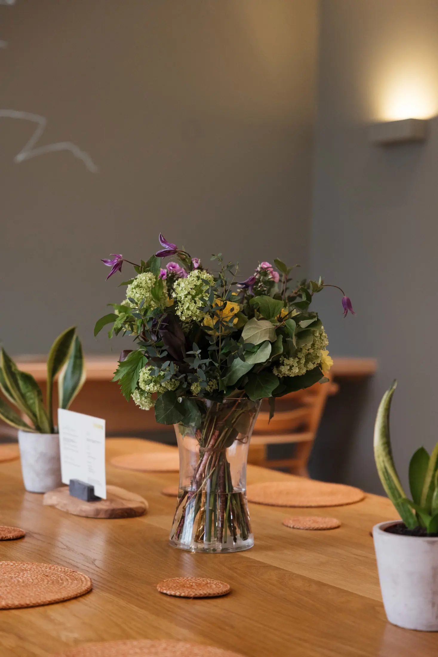 conference table with bouquet of flowers