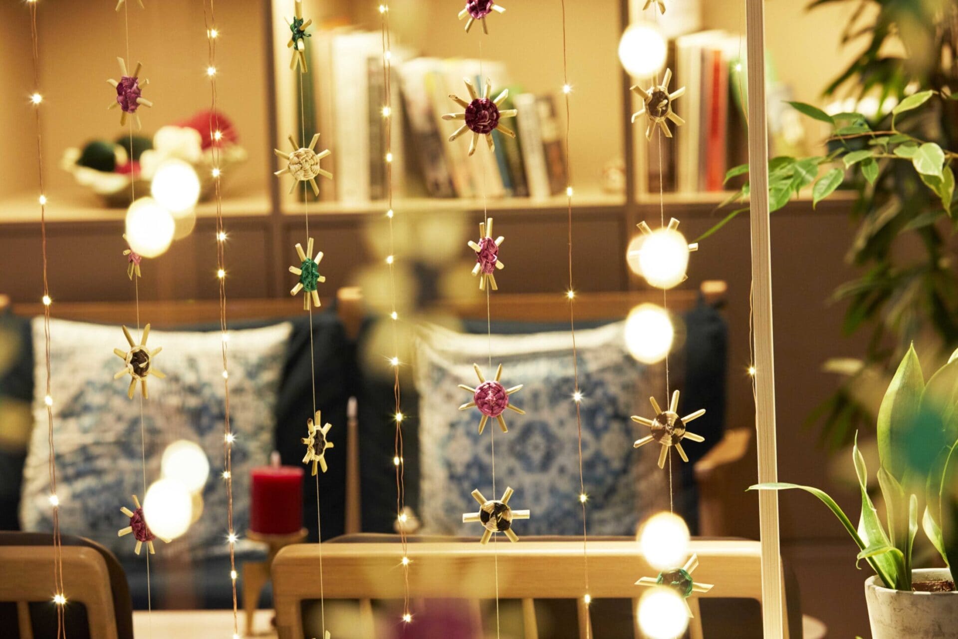 christmas decorations hanging from window
